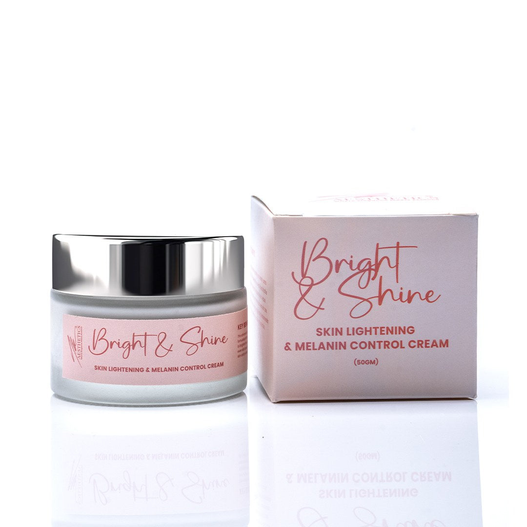 Bright & Shine skin lightening cream jar beside its pink outer carton on a white background