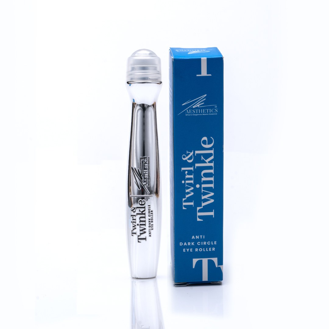 Twirl & Twinkle eye roller beside its blue carton on a white background