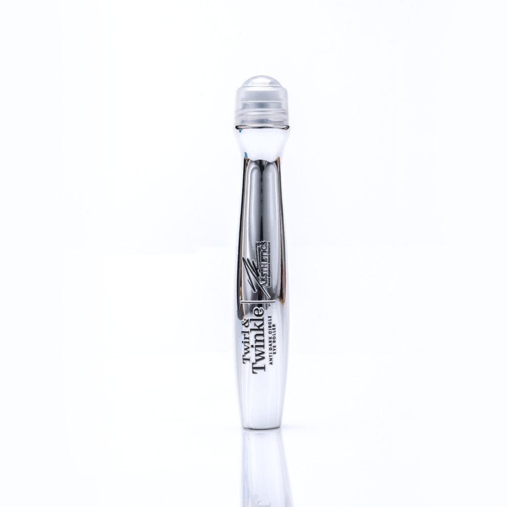 Twirl & Twinkle eye roller with its metal roller-ball applicator on a white background