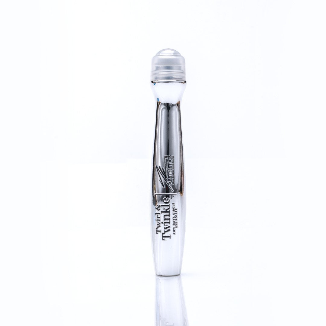 Twirl & Twinkle eye roller with its metal roller-ball applicator on a white background